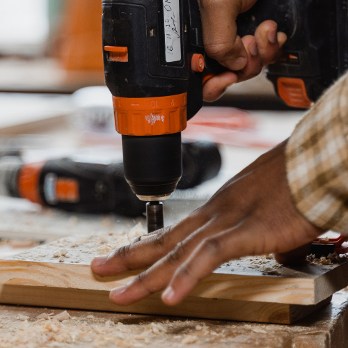 A close up of a power drill being used